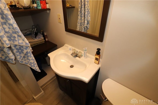 230 S 5th St, Miamisburg, OH 45342 - bathroom with vanity and wood finished floors