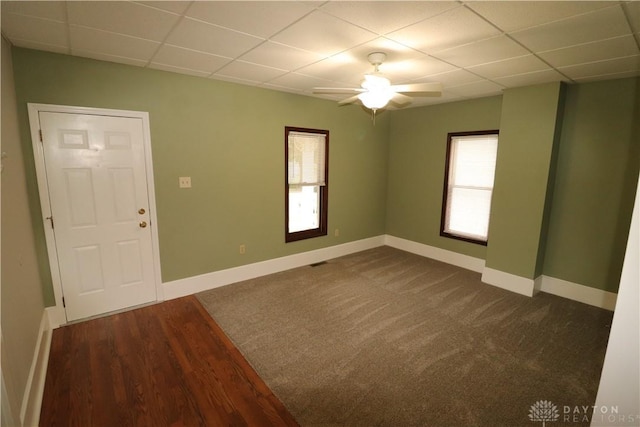 230 S 5th St, Miamisburg, OH 45342 - unfurnished room with a drop ceiling, ceiling fan, and dark wood-style floors
