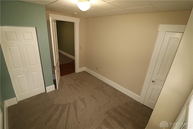 230 S 5th St, Miamisburg, OH 45342 - unfurnished bedroom with carpet flooring, a paneled ceiling, and a closet