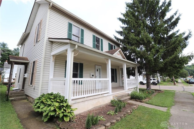 230 S 5th St, Miamisburg, OH 45342 - view of front of property featuring a porch