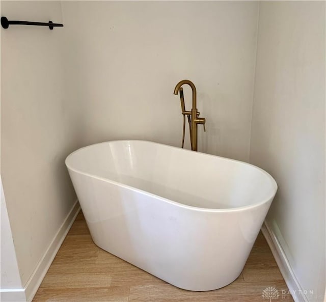 559 E Fosters Maineville Rd, Maineville, OH 45039 - bathroom view of a soaking tub and wood finished floors