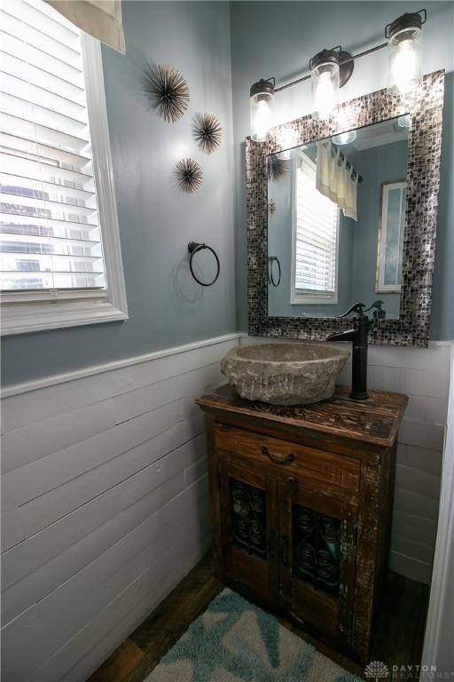 6377 Holloway Dr, Liberty Twp, OH 45044 - bathroom featuring a wainscoted wall and vanity