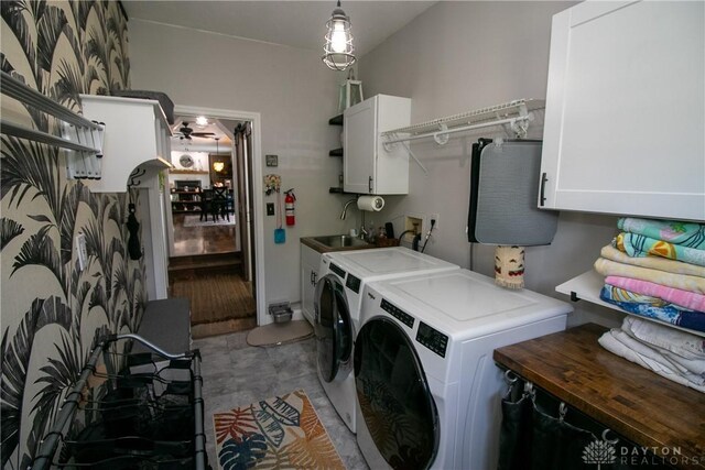 6377 Holloway Dr, Liberty Twp, OH 45044 - washroom with washing machine and dryer, cabinet space, and a ceiling fan