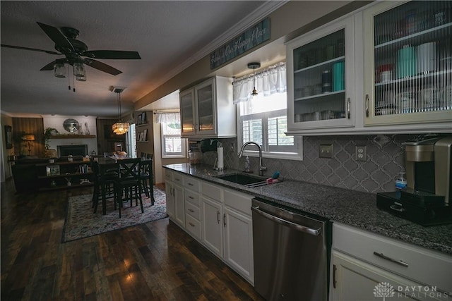 6377 Holloway Dr, Liberty Twp, OH 45044 - kitchen featuring stainless steel dishwasher, glass insert cabinets, dark stone countertops, dark wood finished floors, and backsplash