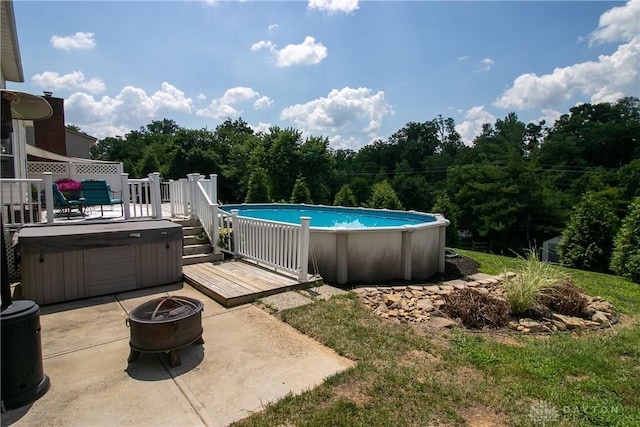 6377 Holloway Dr, Liberty Twp, OH 45044 - outdoor pool with a fire pit, a hot tub, a patio, and a deck