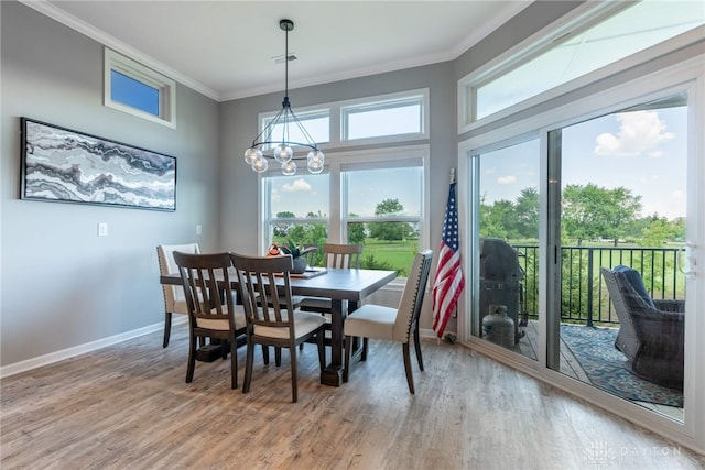 4374 Fairway Ln, Lebanon, OH 45036 - dining area with light wood-style flooring, ornamental molding, and a chandelier