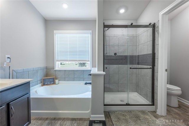 4374 Fairway Ln, Lebanon, OH 45036 - bathroom with a bath, wood finished floors, and a stall shower