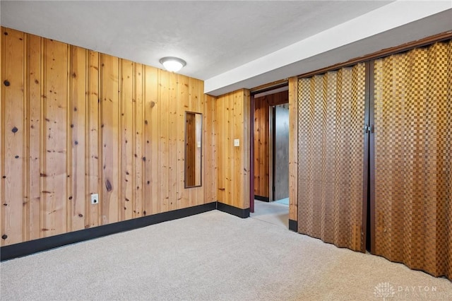1009 Cottage Court Dr, Fairborn, OH 45324 - spare room with carpet floors and wooden walls