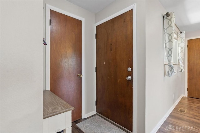 1009 Cottage Court Dr, Fairborn, OH 45324 - entryway featuring wood finished floors and baseboards
