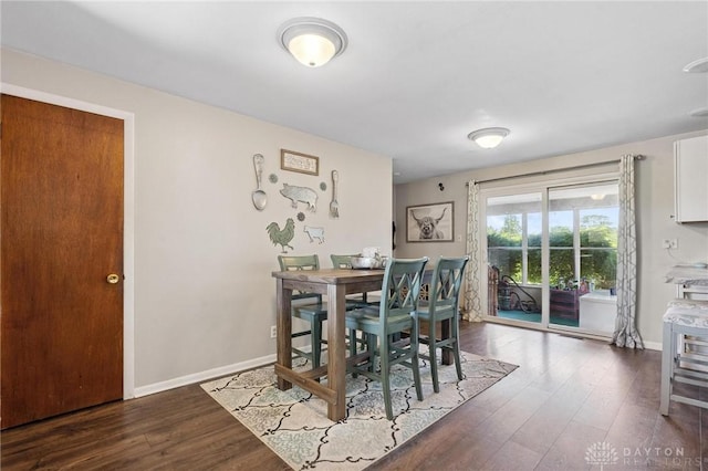1009 Cottage Court Dr, Fairborn, OH 45324 - dining space with wood finished floors and baseboards