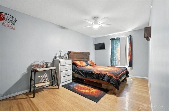 204 Ivy Creek Cv, Jamestown Vlg, OH 45335 - bedroom with wood finished floors and ceiling fan