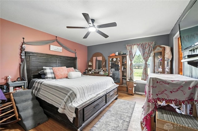 204 Ivy Creek Cv, Jamestown Vlg, OH 45335 - bedroom with light wood-style floors and ceiling fan