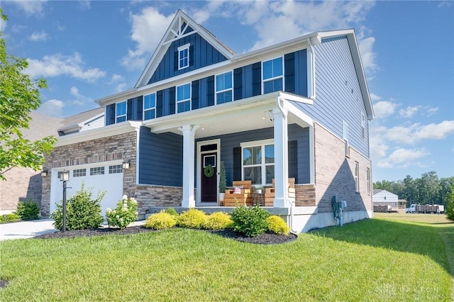 2246 Cold Stream Dr, Centerville, OH 45458 - craftsman inspired home featuring covered porch, a front lawn, stone siding, board and batten siding, and driveway