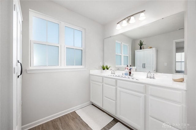 2246 Cold Stream Dr, Centerville, OH 45458 - full bath with double vanity and wood finished floors