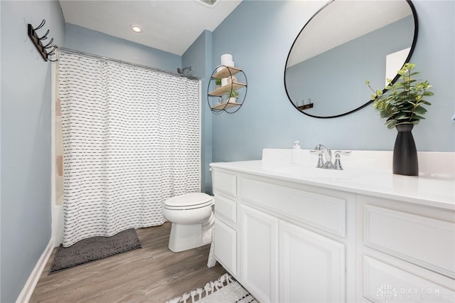 2246 Cold Stream Dr, Centerville, OH 45458 - full bath featuring wood finished floors, vanity, shower / tub combo, and recessed lighting