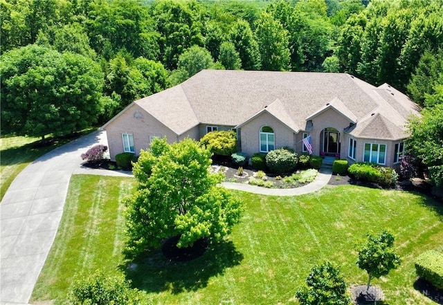 6885 Willow Creek Run, Liberty Twp, OH 45044 - view of front of home featuring a front yard and a wooded view