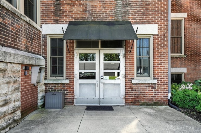 226 Mcdaniel St Unit 160, Dayton, OH 45405 - doorway to property with french doors and brick siding