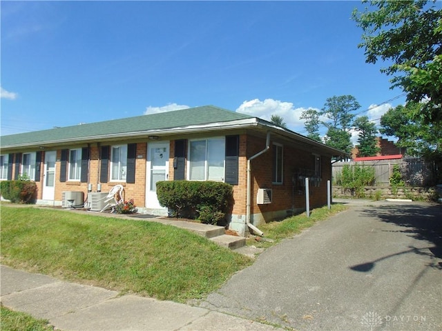 2628 Saint Charles Ave, Dayton, OH 45410 - view of front of property featuring brick siding and a front lawn