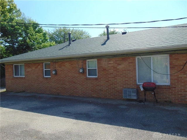 2628 Saint Charles Ave, Dayton, OH 45410 - view of home's exterior with roof with shingles and brick siding