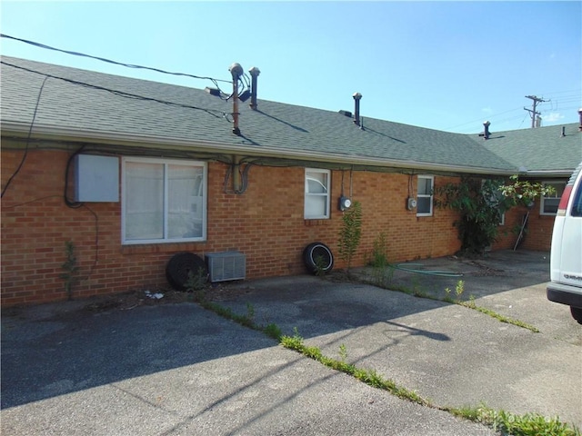 2628 Saint Charles Ave, Dayton, OH 45410 - back of property featuring roof with shingles and brick siding