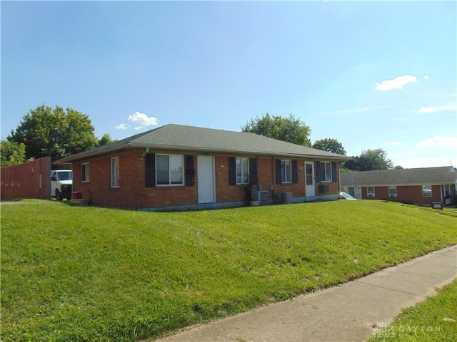 2628 Saint Charles Ave, Dayton, OH 45410 - ranch-style home with brick siding and a front lawn