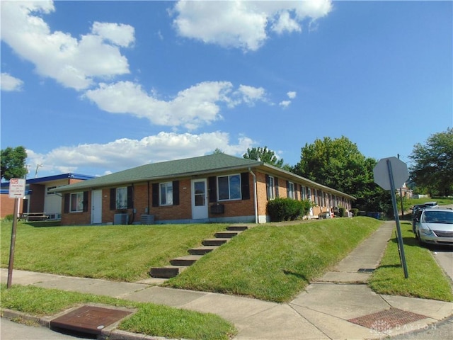 2628 Saint Charles Ave, Dayton, OH 45410 - ranch-style house with brick siding and a front yard