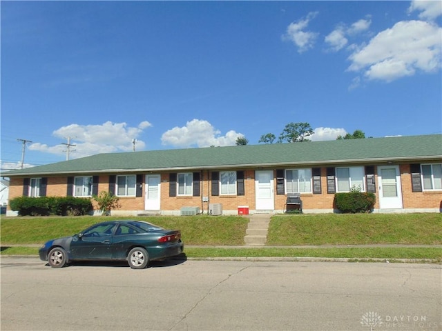 2628 Saint Charles Ave, Dayton, OH 45410 - view of front facade with brick siding and a front yard
