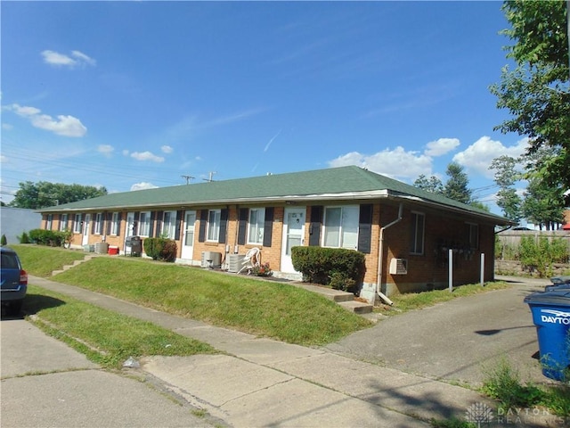 2628 Saint Charles Ave, Dayton, OH 45410 - ranch-style home featuring brick siding and a front lawn