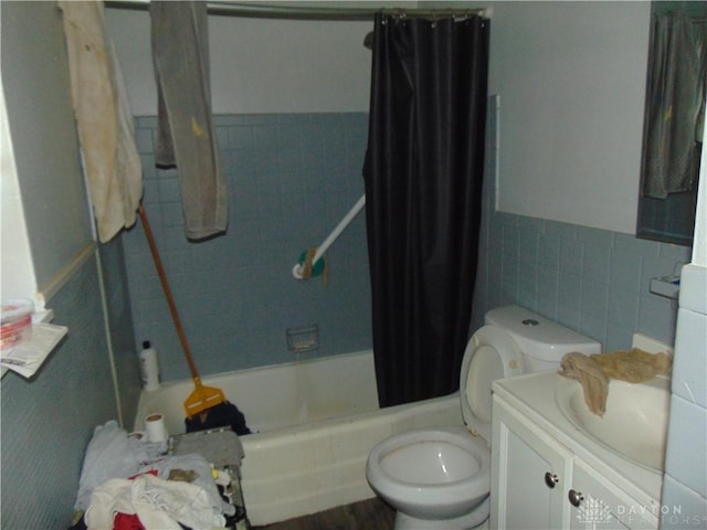 2628 Saint Charles Ave, Dayton, OH 45410 - bathroom with vanity, tile walls, shower / bath combo, and a wainscoted wall