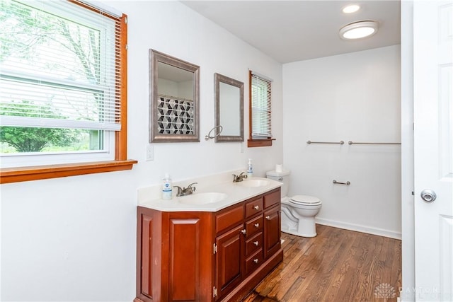 2841 Prospect Dr, Fairborn, OH 45324 - full bathroom with double vanity and wood finished floors