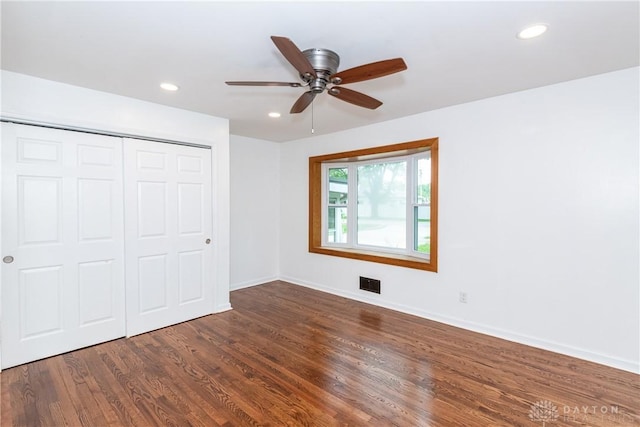 2841 Prospect Dr, Fairborn, OH 45324 - unfurnished bedroom featuring a closet, dark wood-style floors, recessed lighting, and ceiling fan
