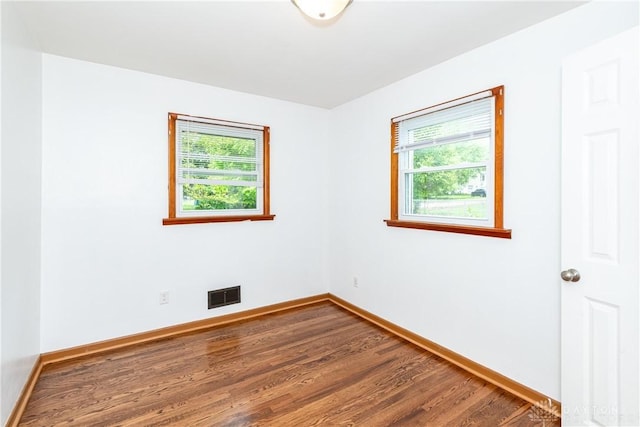 2841 Prospect Dr, Fairborn, OH 45324 - unfurnished room with plenty of natural light and wood finished floors