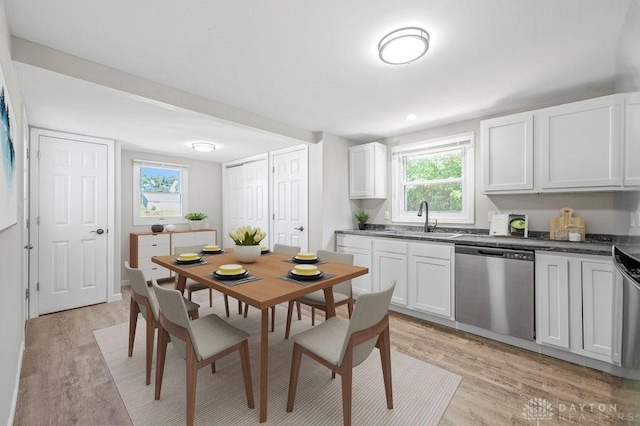 9351 Marcella Dr, Franklin, OH 45005 - dining space with light wood-style flooring and plenty of natural light