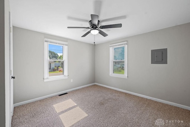 9351 Marcella Dr, Franklin, OH 45005 - unfurnished room featuring electric panel, carpet flooring, and ceiling fan