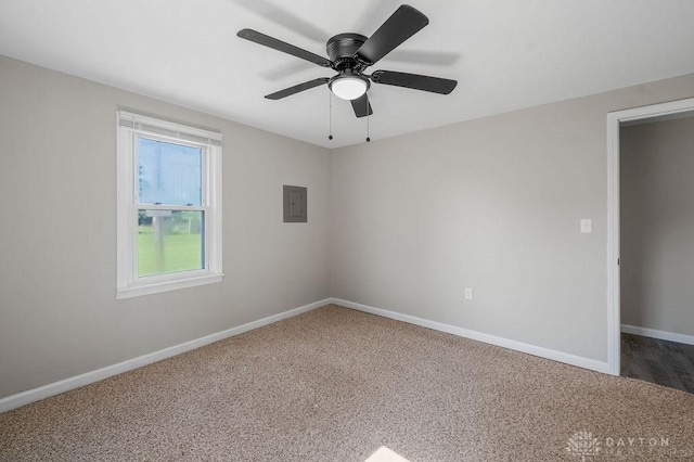 9351 Marcella Dr, Franklin, OH 45005 - unfurnished room with electric panel, carpet, and ceiling fan