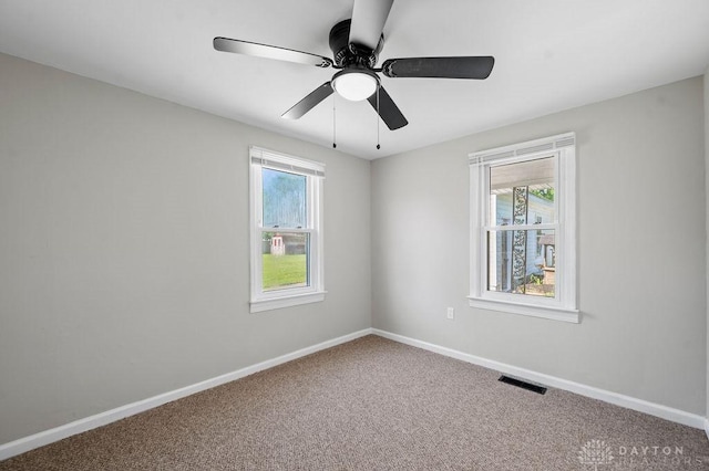 9351 Marcella Dr, Franklin, OH 45005 - carpeted spare room with ceiling fan and baseboards