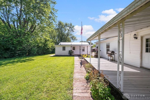 9351 Marcella Dr, Franklin, OH 45005 - view of grassy yard with a deck