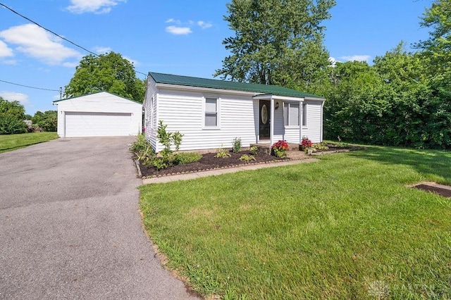 9351 Marcella Dr, Franklin, OH 45005 - view of front of home with an outdoor structure, a garage, a front yard, and a metal roof