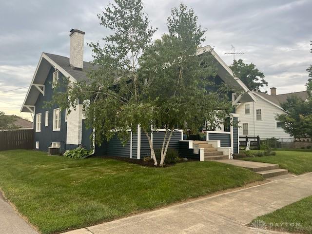 63 N Main St, West Alexandria, OH 45381 - view of front facade featuring a chimney