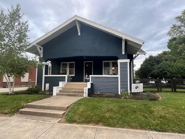 63 N Main St, West Alexandria, OH 45381 - bungalow with a porch