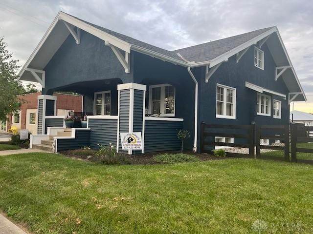 63 N Main St, West Alexandria, OH 45381 - rear view of property with a porch