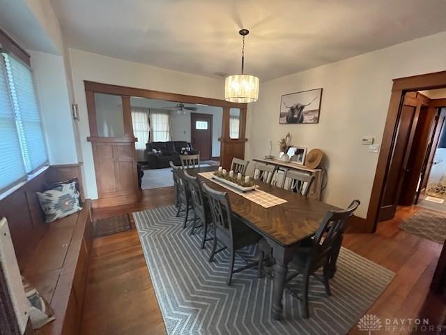 63 N Main St, West Alexandria, OH 45381 - dining area with wood finished floors, ceiling fan, and a chandelier