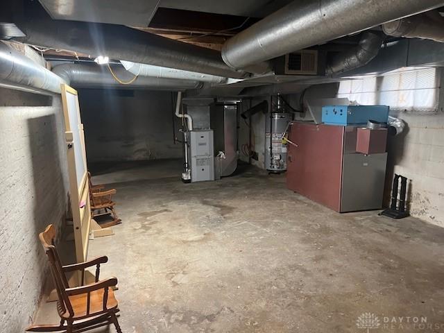 63 N Main St, West Alexandria, OH 45381 - below grade area featuring secured water heater and heating unit