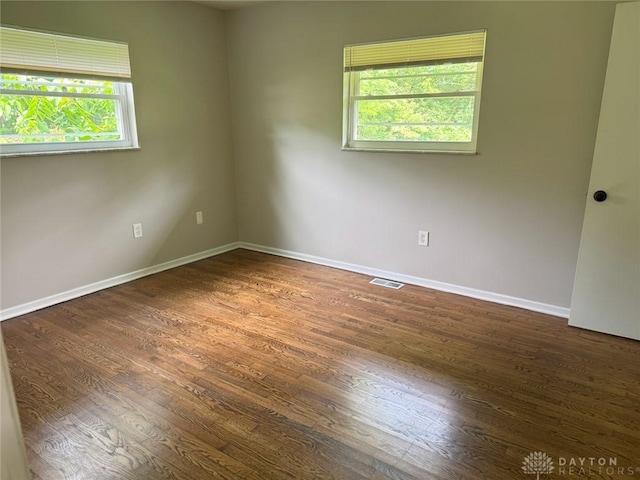 6686 Catskill Dr, Franklin, OH 45005 - unfurnished room featuring healthy amount of natural light and wood finished floors