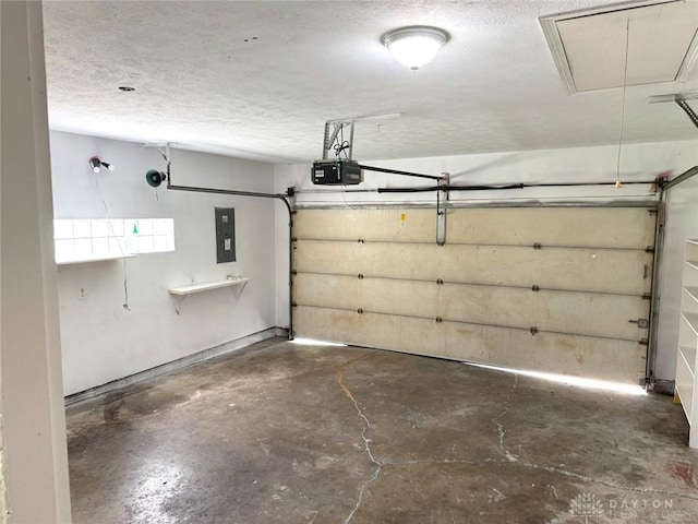 6686 Catskill Dr, Franklin, OH 45005 - garage with a garage door opener and electric panel