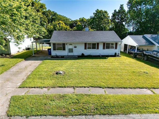 260 Chamberlin Dr, Hamilton, OH 45013 - view of front of property with driveway, a front yard, an attached carport, and a chimney