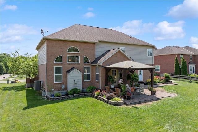 5535 Longhunter Chase Dr, Liberty Twp, OH 45044 - back of property with brick siding and a patio