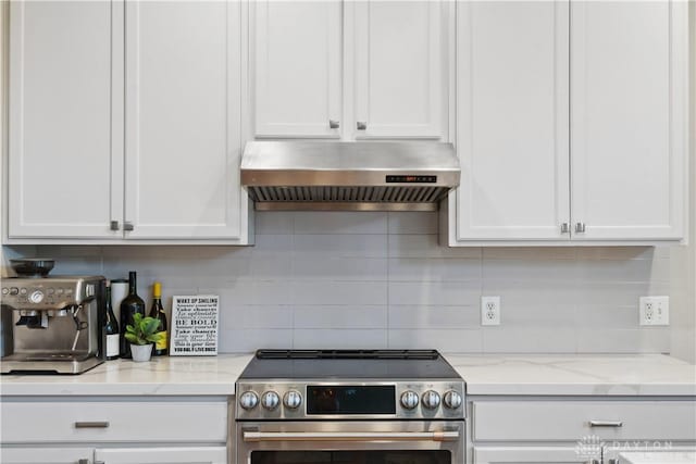 5535 Longhunter Chase Dr, Liberty Twp, OH 45044 - kitchen featuring stainless steel electric range oven, extractor fan, white cabinetry, backsplash, and light stone counters