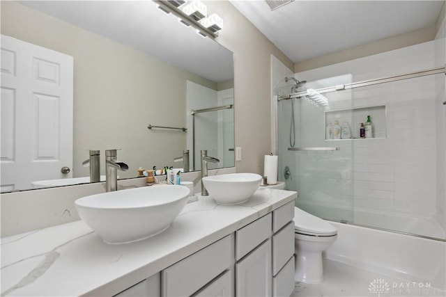 5535 Longhunter Chase Dr, Liberty Twp, OH 45044 - full bathroom with double vanity and bath / shower combo with glass door
