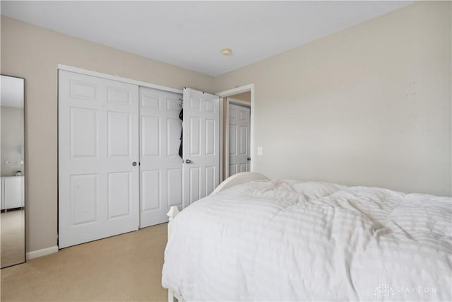5535 Longhunter Chase Dr, Liberty Twp, OH 45044 - bedroom featuring light carpet and a closet